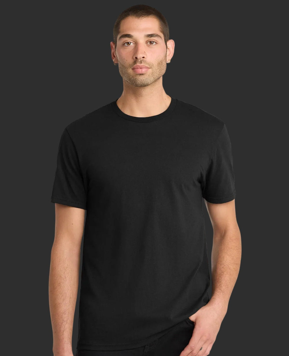 Man wearing a black t-shirt and pants on a white background