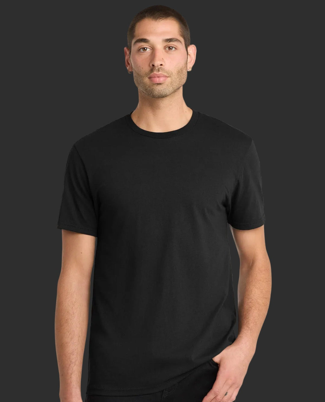 Man wearing a black t-shirt and pants on a white background